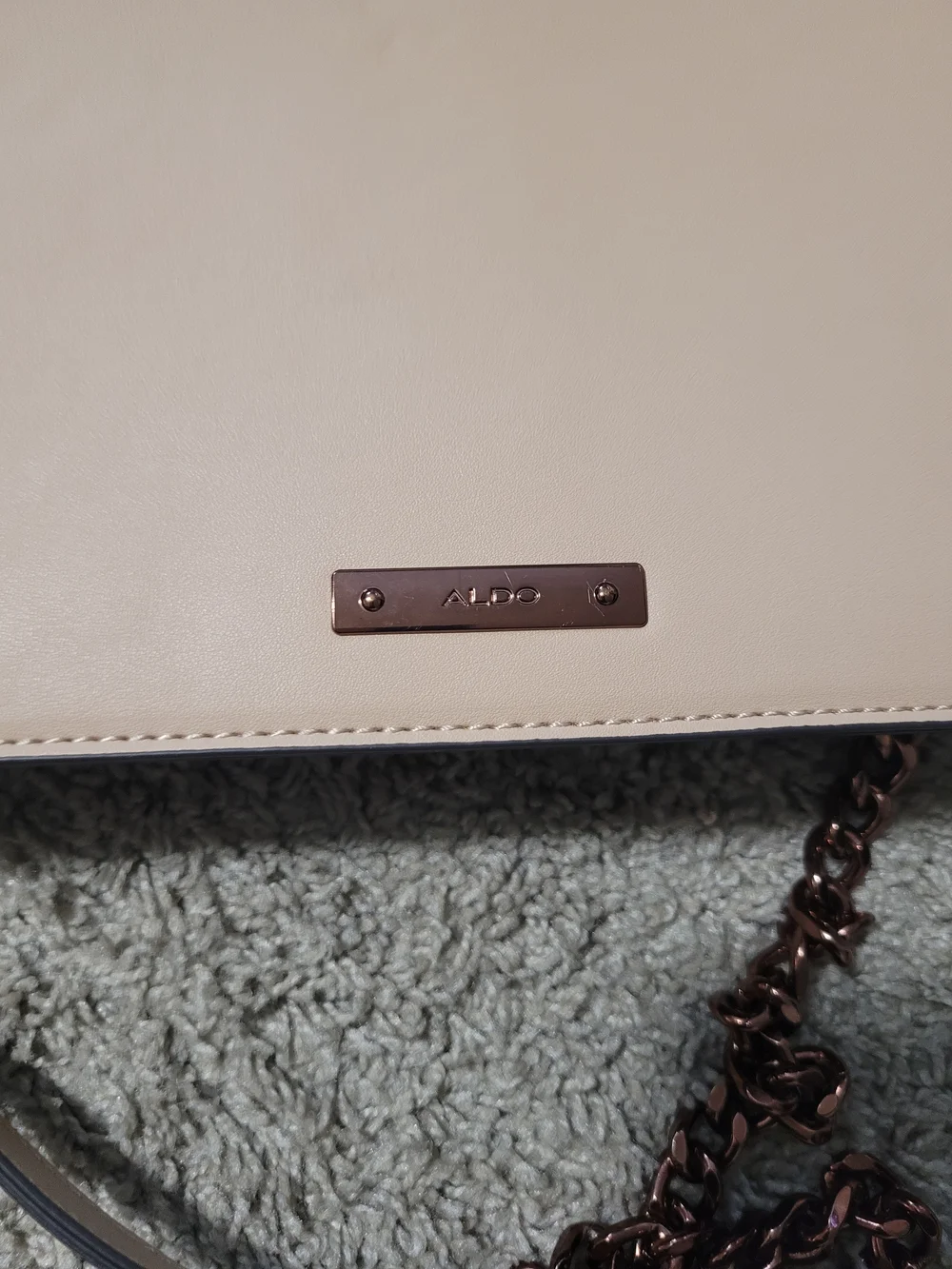 ALDO Greenwald Crossbody Bag in a beige/blush color featuring a chevron-quilted - Picture 2 of 7